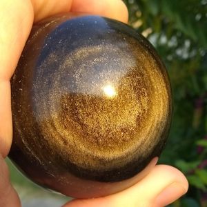 golden sheen obsidian sphere